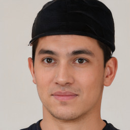 Neutral white young-adult male with short  black hair and brown eyes