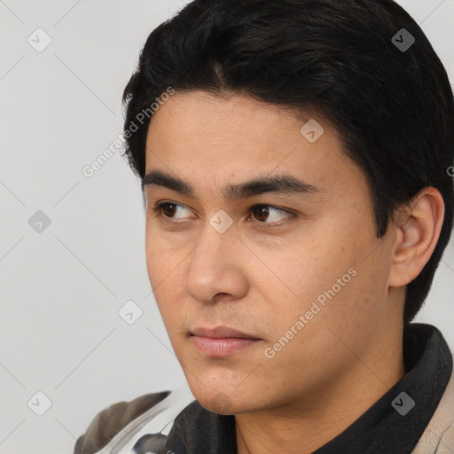 Neutral white young-adult male with short  black hair and brown eyes