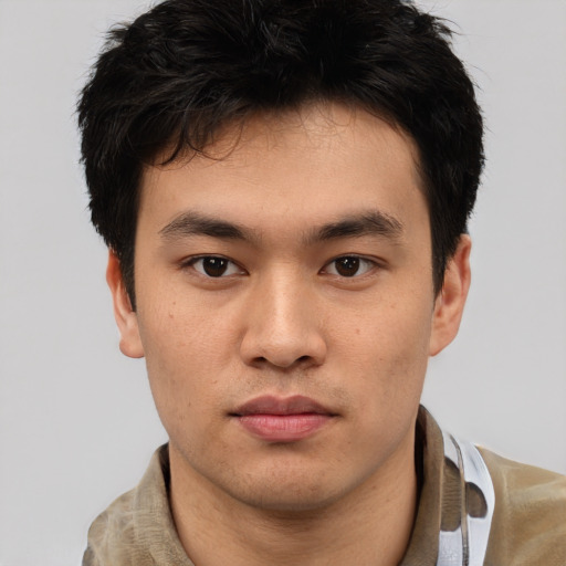 Neutral asian young-adult male with short  brown hair and brown eyes