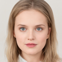 Neutral white young-adult female with medium  brown hair and grey eyes