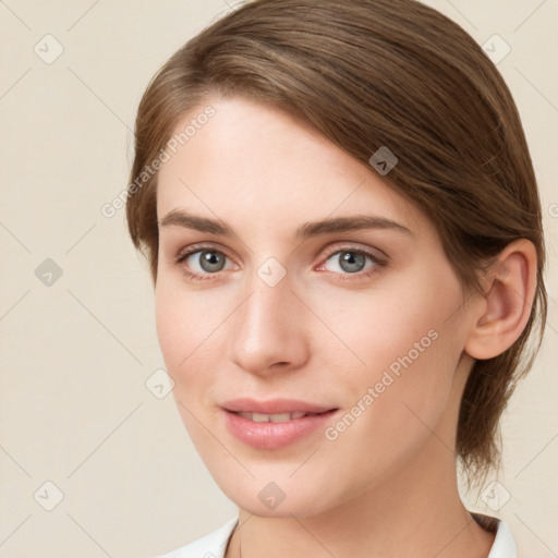 Joyful white young-adult female with medium  brown hair and green eyes