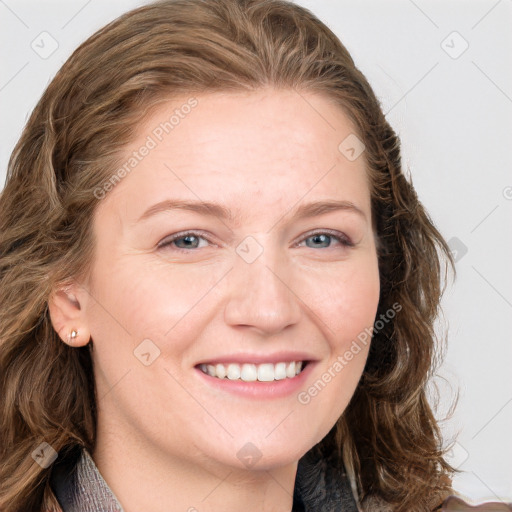 Joyful white young-adult female with long  brown hair and blue eyes