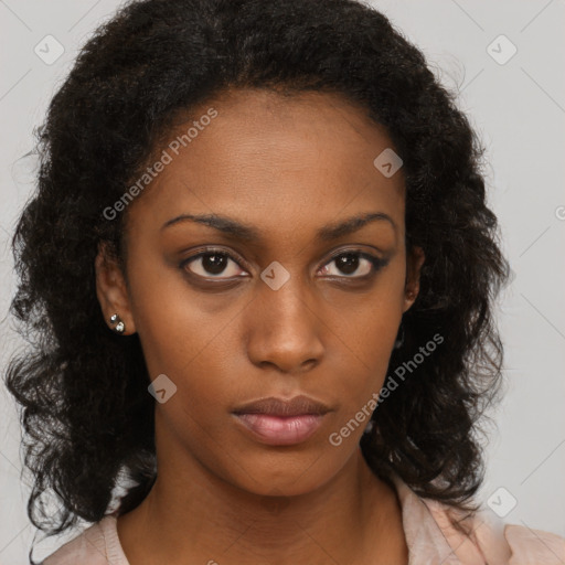 Neutral black young-adult female with medium  brown hair and brown eyes