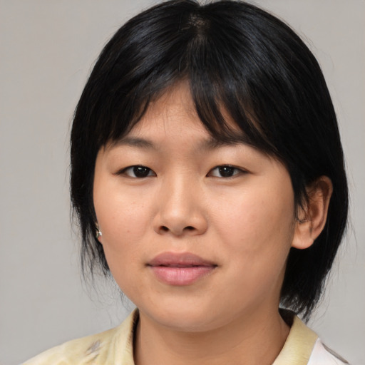 Neutral asian young-adult female with medium  black hair and brown eyes