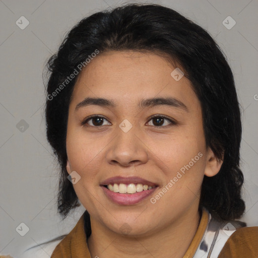 Joyful asian young-adult female with medium  black hair and brown eyes