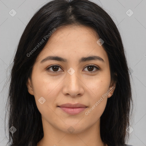 Joyful latino young-adult female with long  brown hair and brown eyes