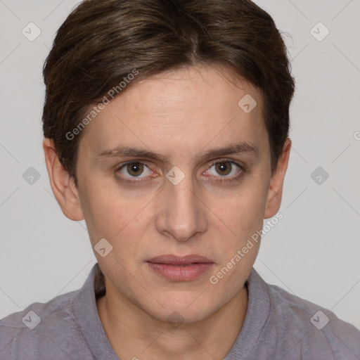 Joyful white young-adult female with short  brown hair and grey eyes