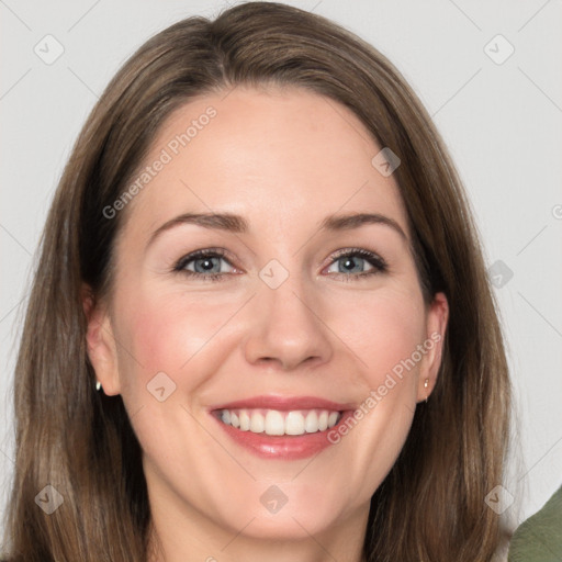 Joyful white adult female with medium  brown hair and grey eyes