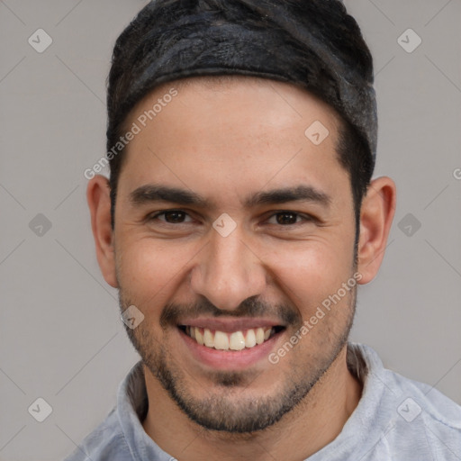 Joyful white young-adult male with short  black hair and brown eyes