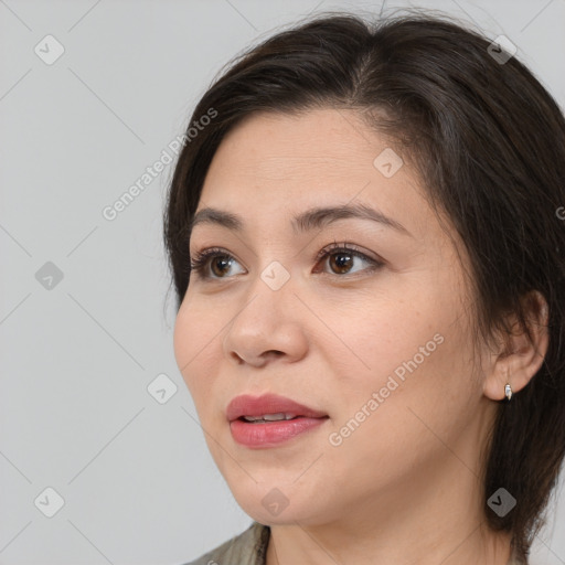 Joyful white young-adult female with medium  brown hair and brown eyes