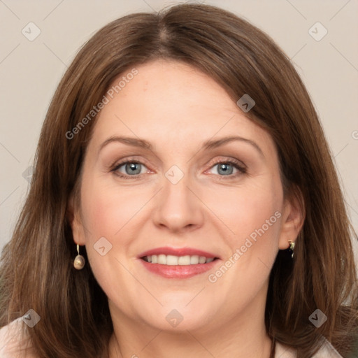 Joyful white adult female with medium  brown hair and grey eyes