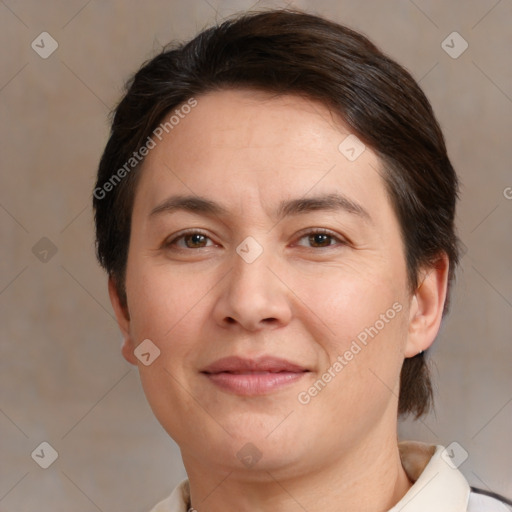 Joyful white adult female with medium  brown hair and brown eyes