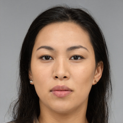 Neutral asian young-adult female with long  brown hair and brown eyes