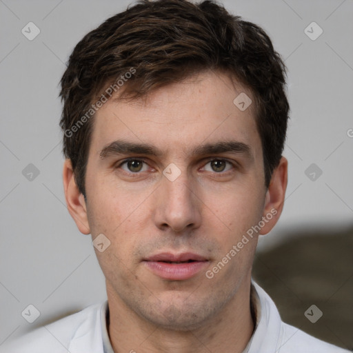 Neutral white young-adult male with short  brown hair and brown eyes