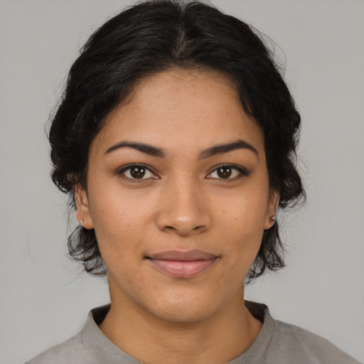 Joyful asian young-adult female with medium  brown hair and brown eyes