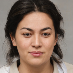 Joyful asian young-adult female with medium  brown hair and brown eyes