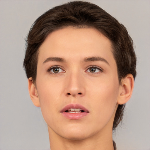 Neutral white young-adult female with short  brown hair and brown eyes