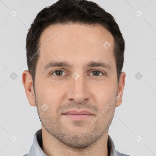 Joyful white young-adult male with short  brown hair and brown eyes