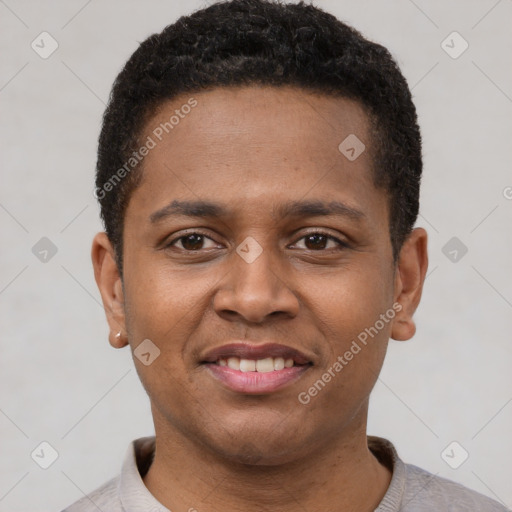 Joyful latino young-adult male with short  brown hair and brown eyes