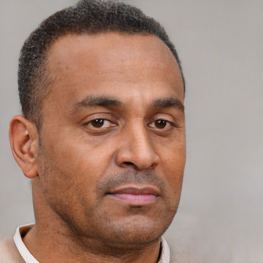 Neutral black young-adult male with short  brown hair and brown eyes