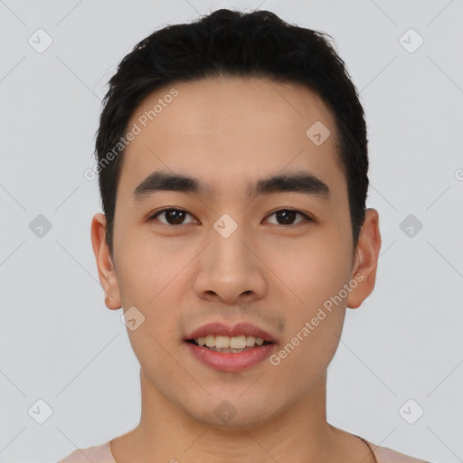 Joyful asian young-adult male with short  black hair and brown eyes