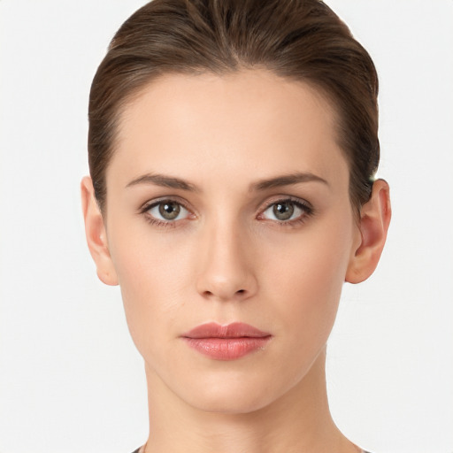 Neutral white young-adult female with short  brown hair and brown eyes