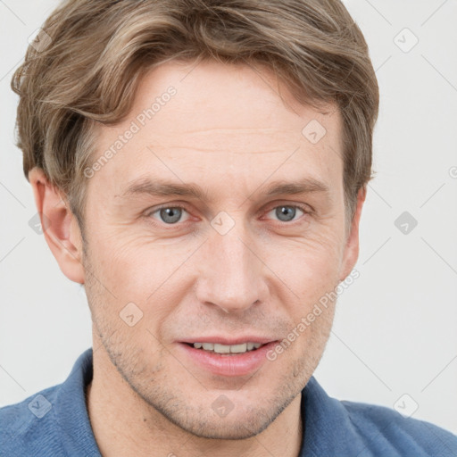 Joyful white adult male with short  brown hair and grey eyes