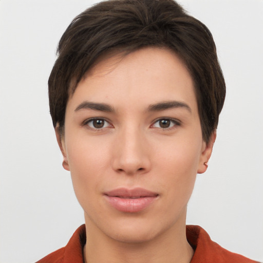 Neutral white young-adult female with short  brown hair and brown eyes