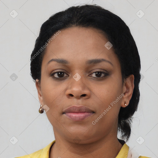 Neutral black young-adult female with short  black hair and brown eyes