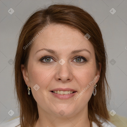 Joyful white adult female with medium  brown hair and blue eyes