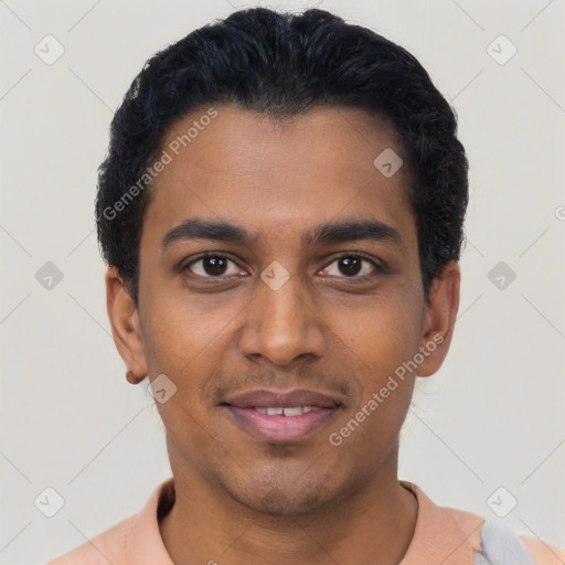 Joyful black young-adult male with short  black hair and brown eyes