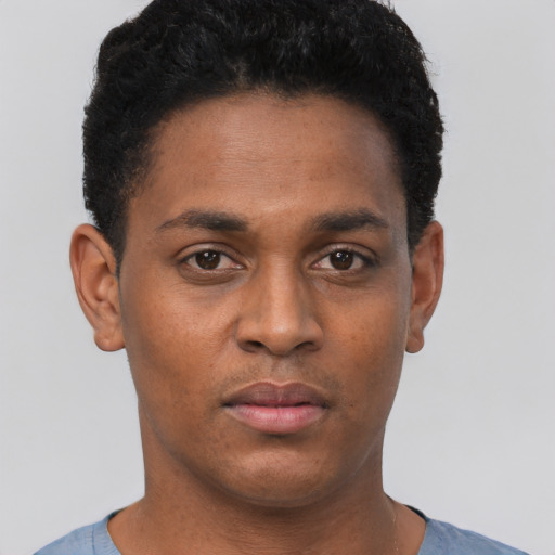 Neutral black young-adult male with short  black hair and brown eyes