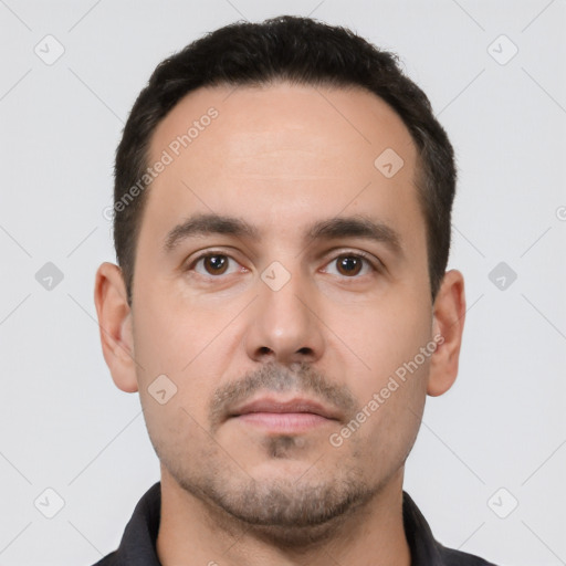 Neutral white young-adult male with short  black hair and brown eyes