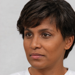 Neutral white adult female with short  brown hair and brown eyes