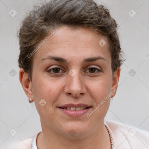 Joyful white adult female with short  brown hair and brown eyes