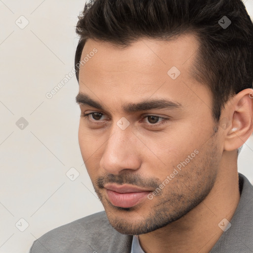 Neutral white young-adult male with short  brown hair and brown eyes