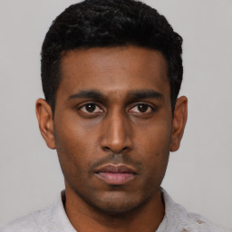 Neutral black young-adult male with short  black hair and brown eyes