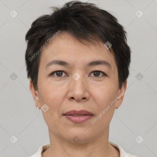 Joyful white adult female with short  brown hair and brown eyes