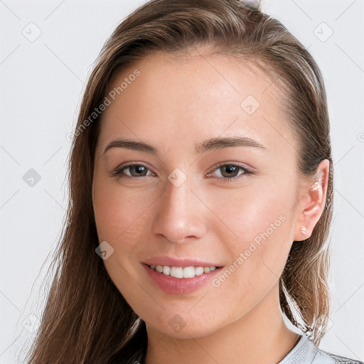 Joyful white young-adult female with long  brown hair and grey eyes