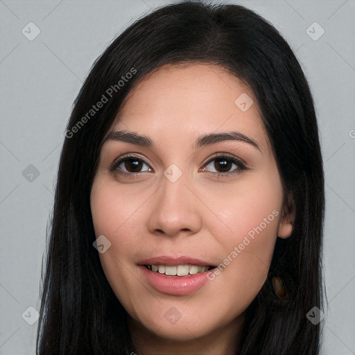 Joyful white young-adult female with long  black hair and brown eyes