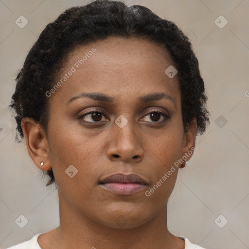 Neutral black young-adult female with short  brown hair and brown eyes