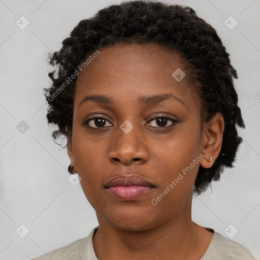 Neutral black young-adult female with short  brown hair and brown eyes