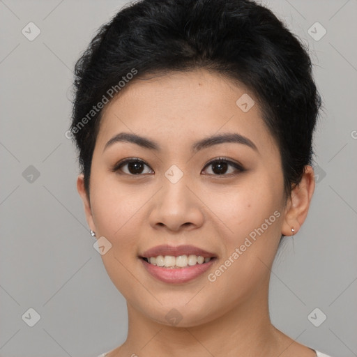 Joyful asian young-adult female with short  brown hair and brown eyes