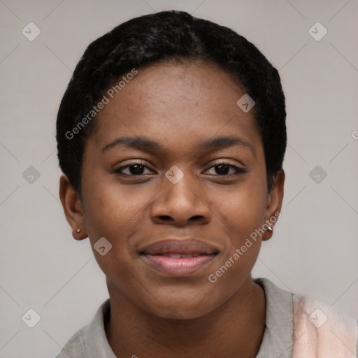 Joyful black young-adult female with short  black hair and brown eyes