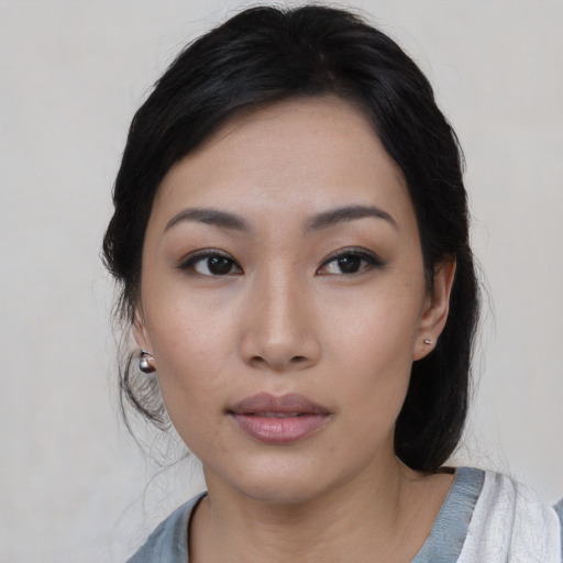 Neutral asian young-adult female with medium  black hair and brown eyes