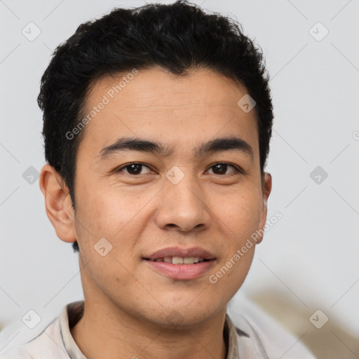 Joyful latino young-adult male with short  brown hair and brown eyes