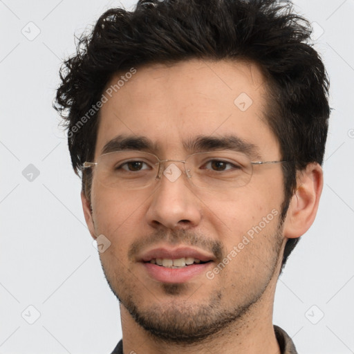 Joyful white young-adult male with short  black hair and brown eyes