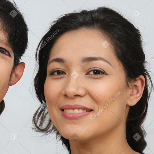 Joyful latino young-adult female with medium  brown hair and brown eyes