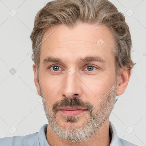 Neutral white adult male with short  brown hair and brown eyes