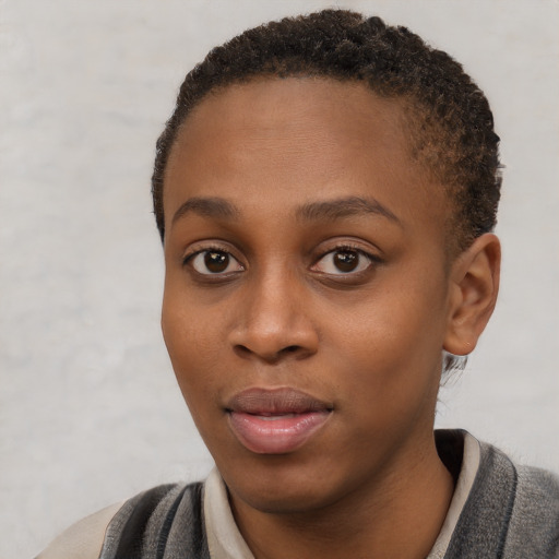 Neutral black young-adult female with short  brown hair and brown eyes